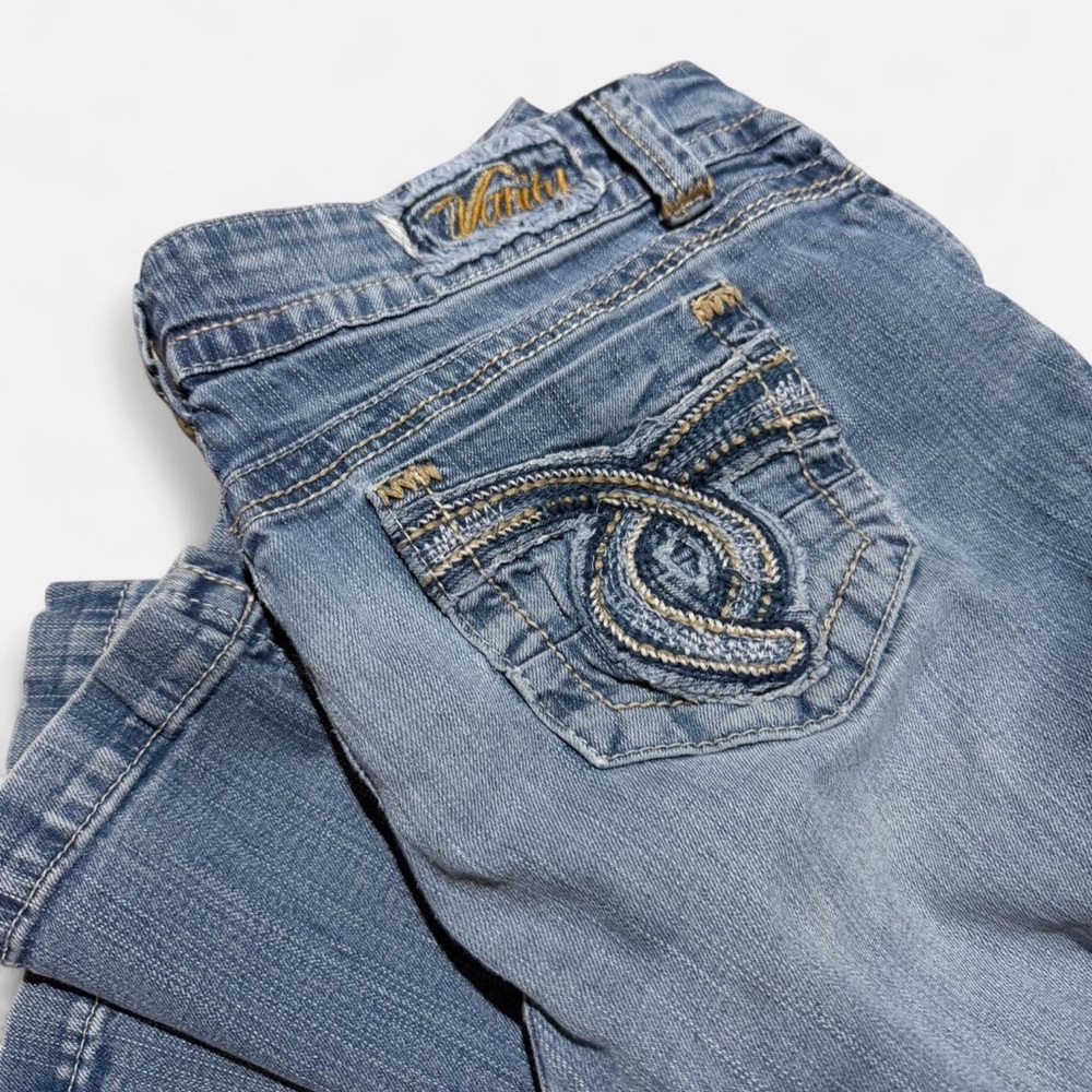Y2K Vanity blue low rise bootcut jeans with gold stitching and distressing lace
